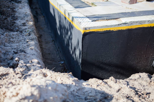 Professional Exterior Waterproofing technician working in New Paris, OH